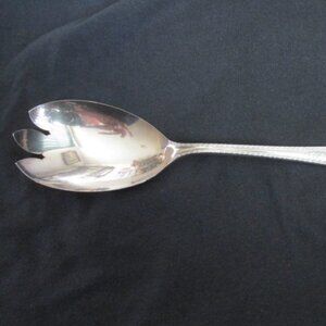 Wm A Rogers salad spoon